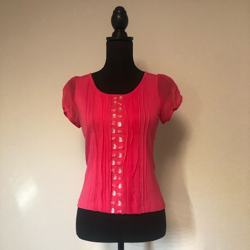 Knit top with embellishments